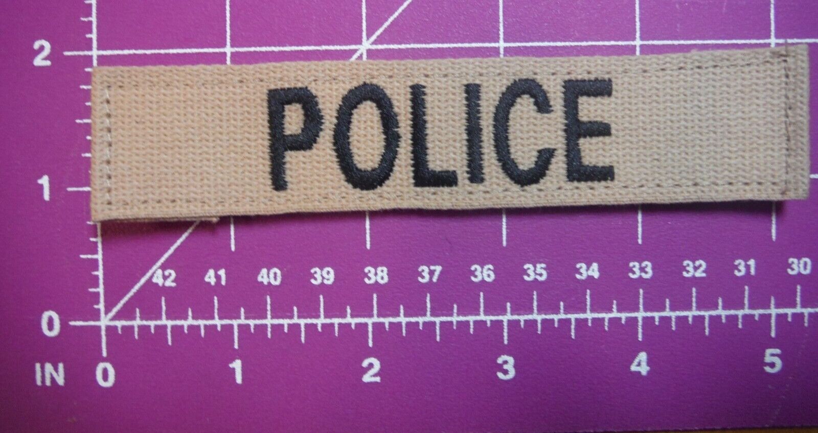 name tape-brown with black POLICE lettering