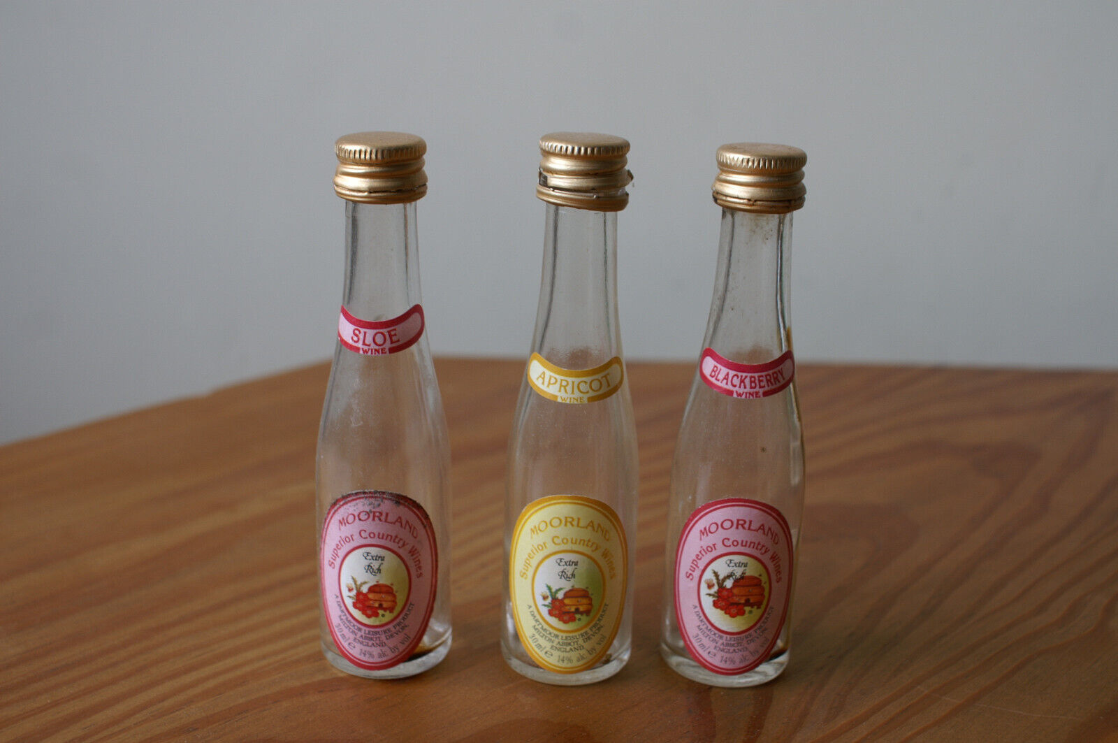 Three empty Moorland Superior Country Wines Miniature Bottles