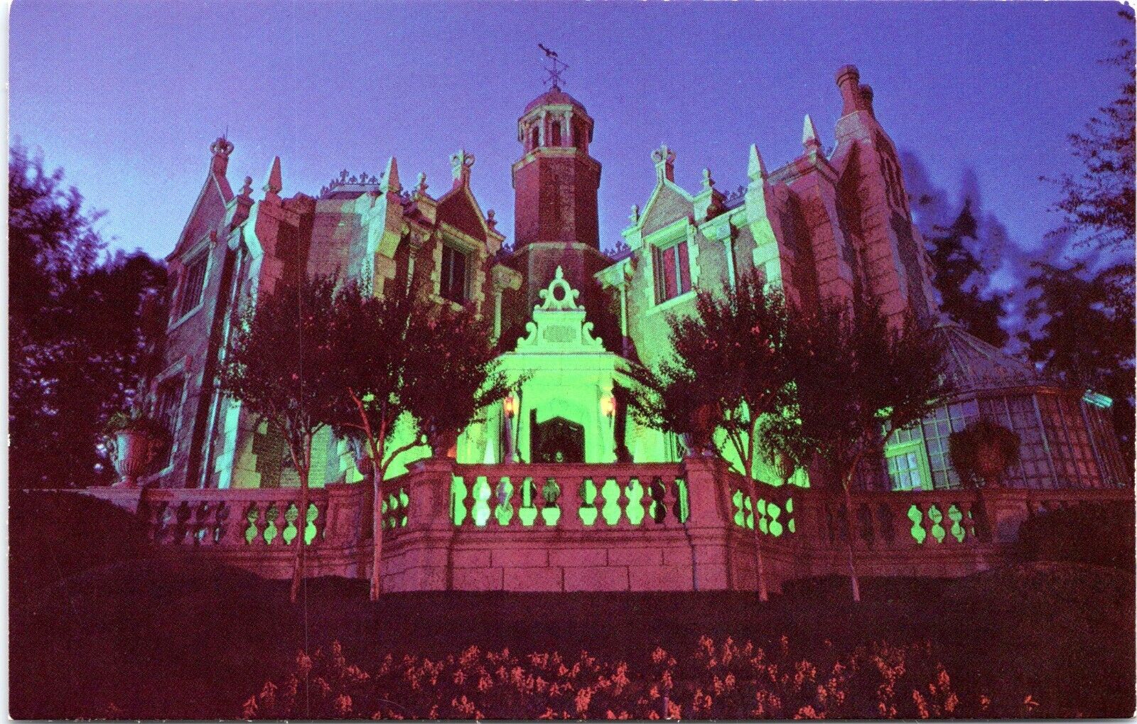 Haunted Mansion at night, Disney World, Florida - Vintage Chrome Postcard