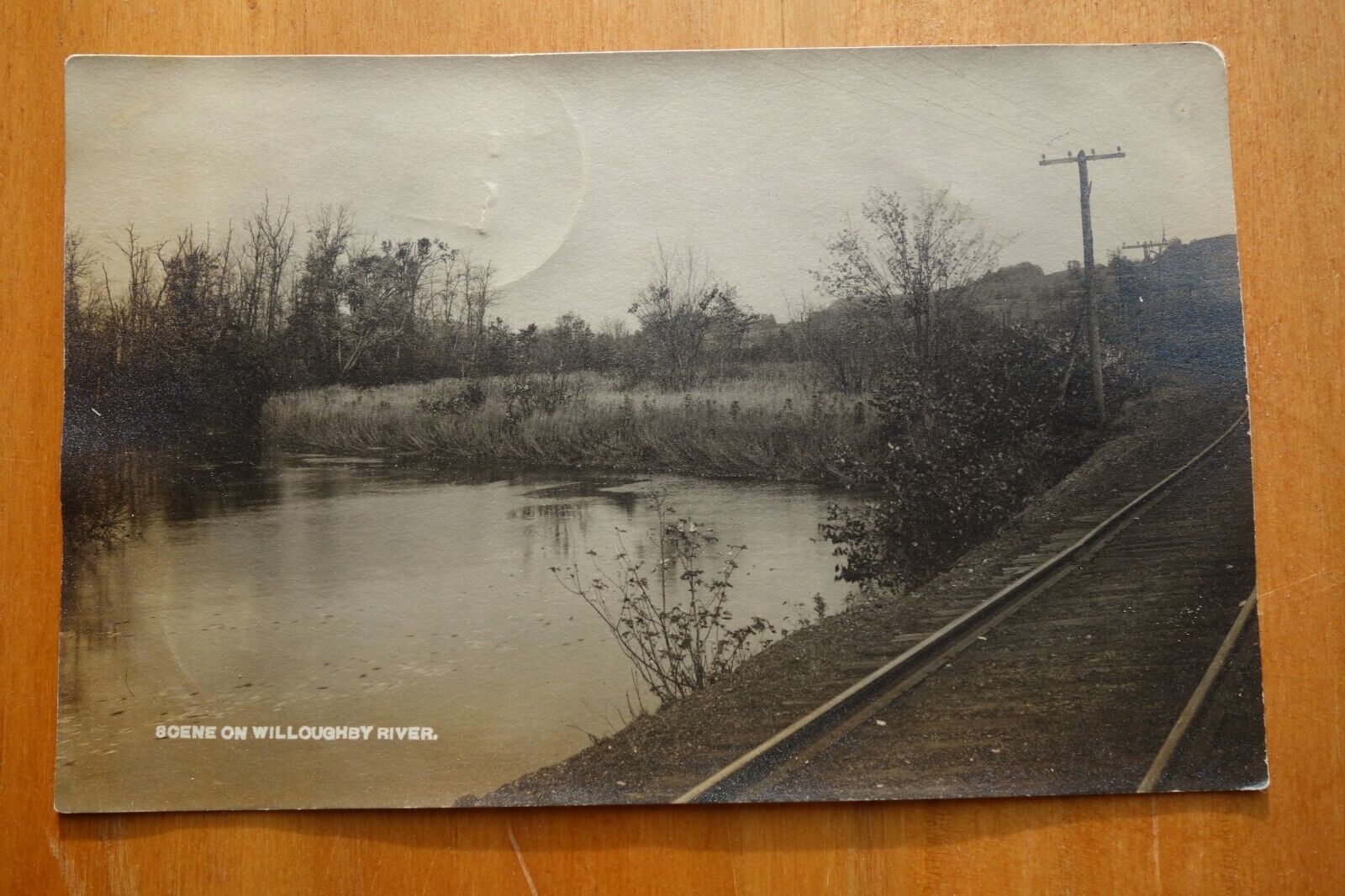 railroad scene on Willoughby River, Barton, VT real photo postcard pmk 1912