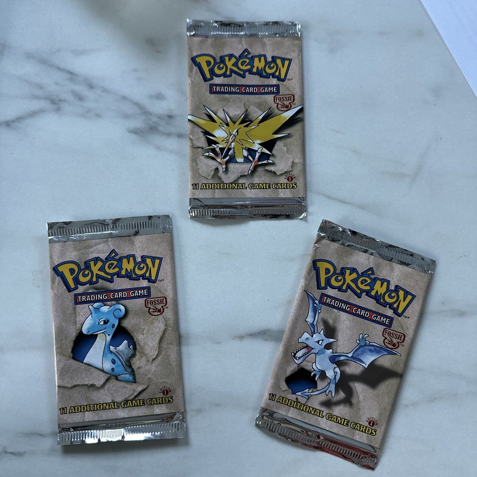 Perfect Open Original Pokémon TCG 1st Ed. Stamped Fossil Empty Booster Art