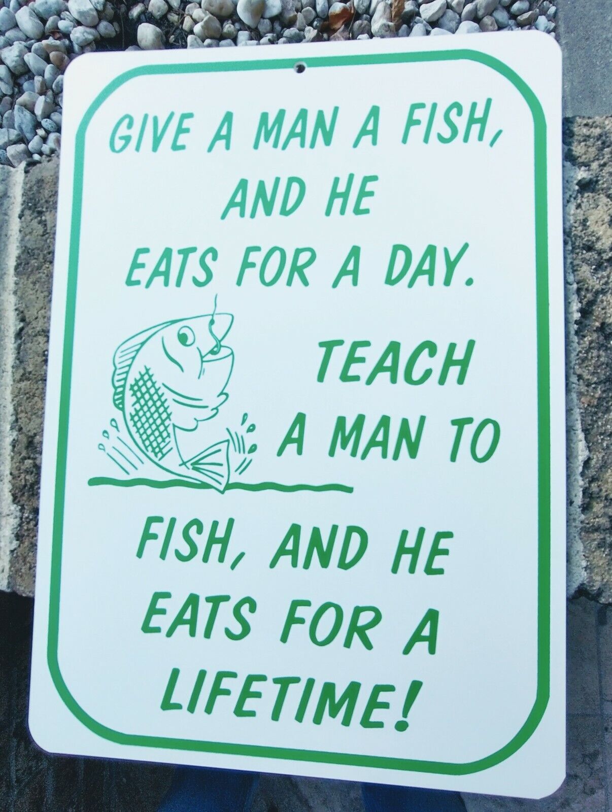 sign humorous funny Teach a man to fish and he eats for a lifetime