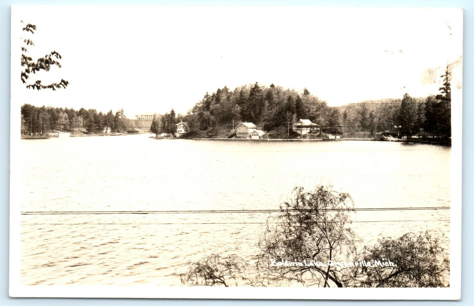 POSTCARD RPPC Baldwin Lake Greenville Michigan 1945 Shoreline Cottages