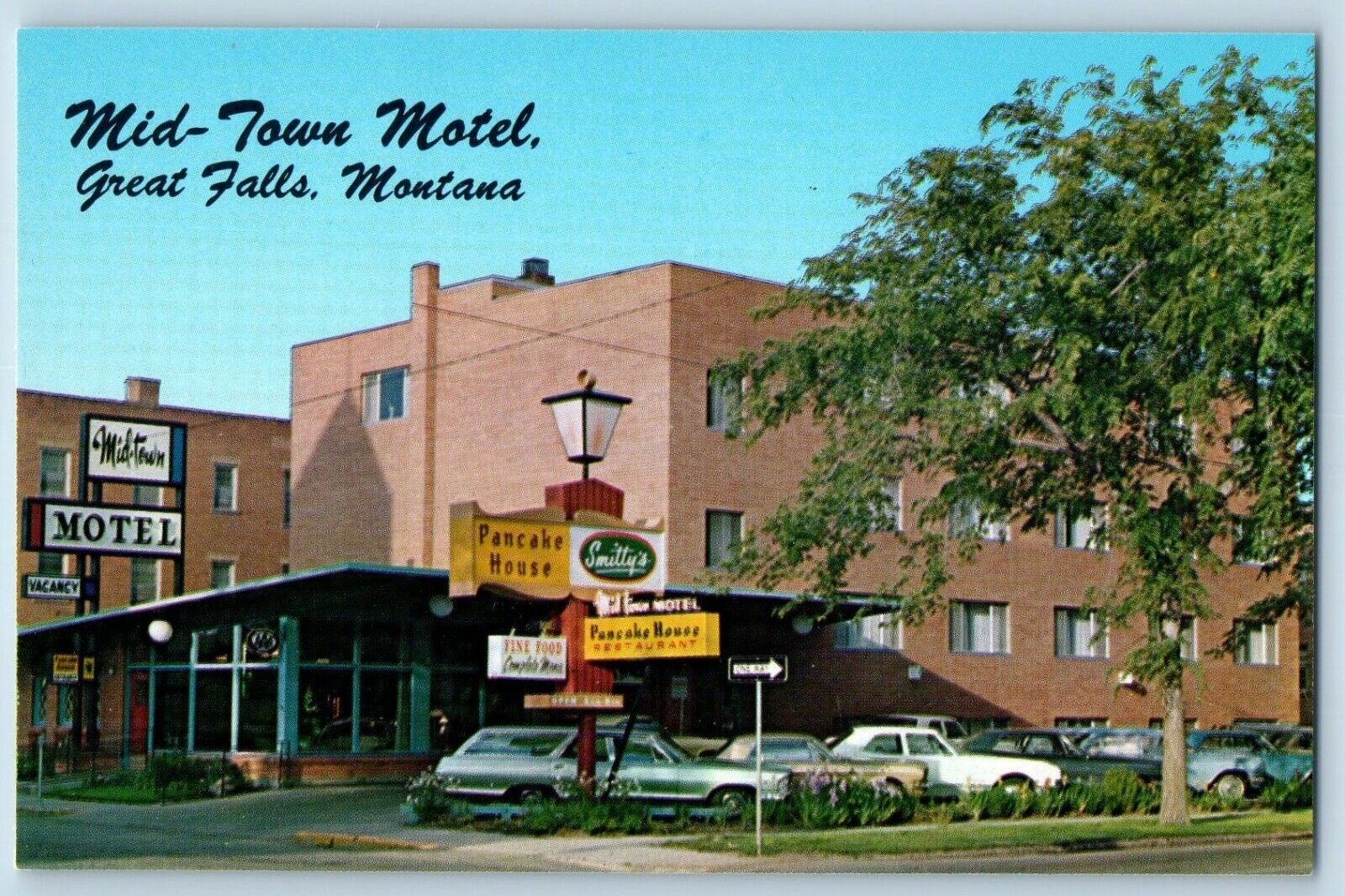 Great Falls Montana Postcard Mid-Town Motel Building Exterior Classic Cars c1960