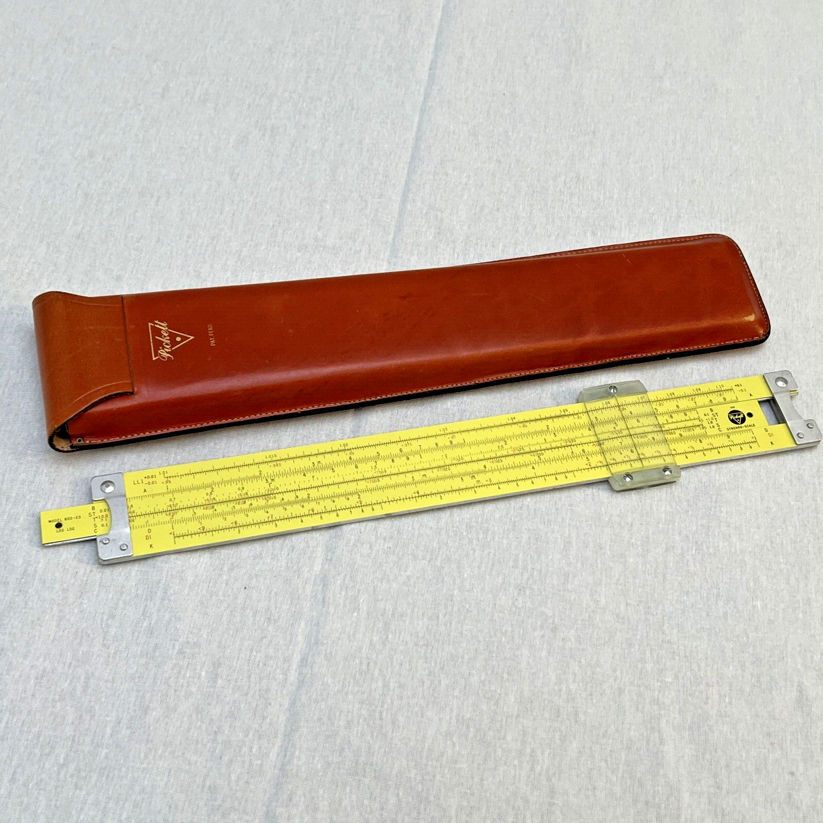 Pickett & Eckel Inc Ruler  in a red-brown leather case VGT Retro Aluminum