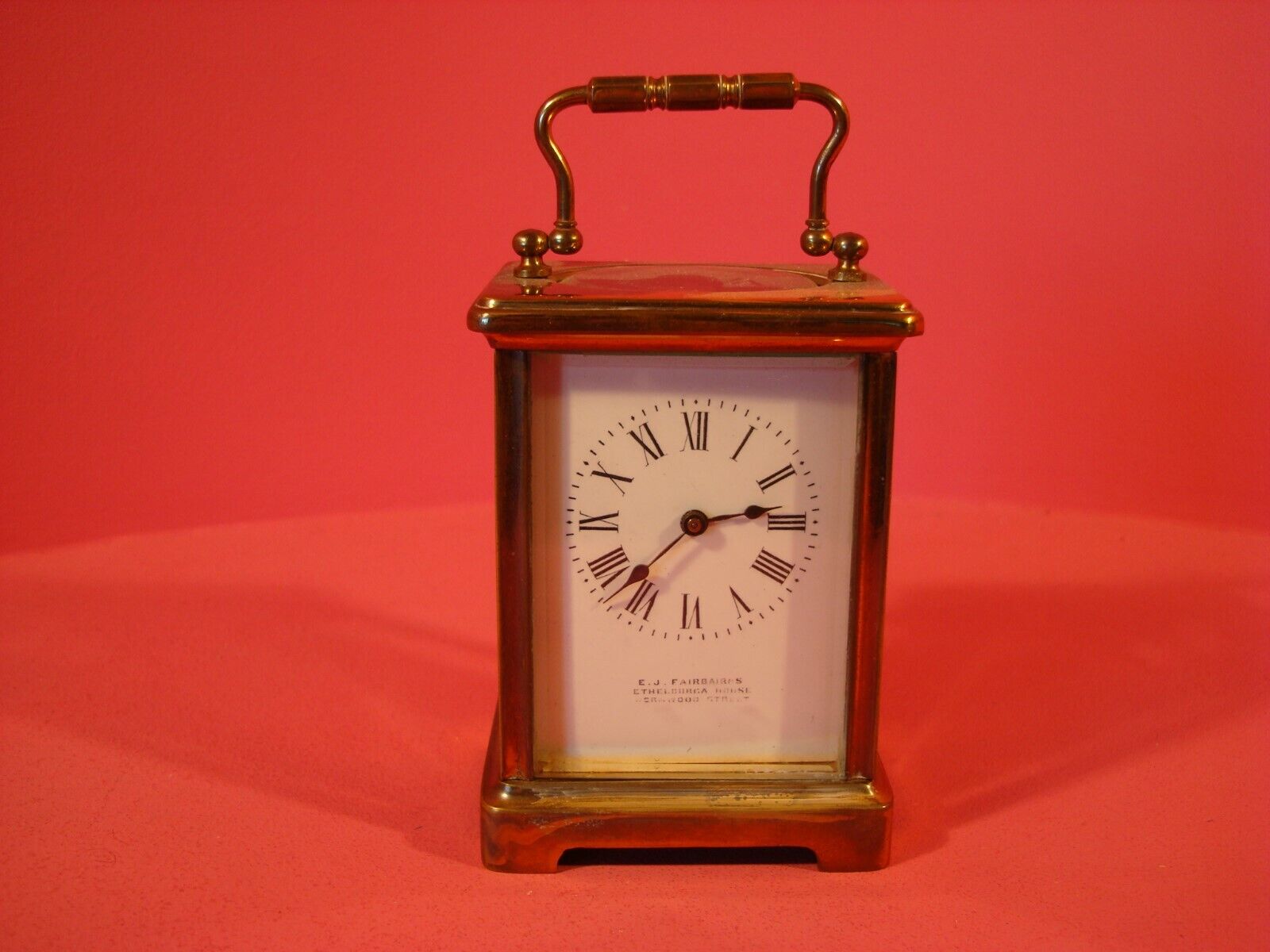 ANTIQUE CARRIAGE CLOCK, ELISABETH JANE FAIRBAIRNS, CIRCA 1900. WITH KEY