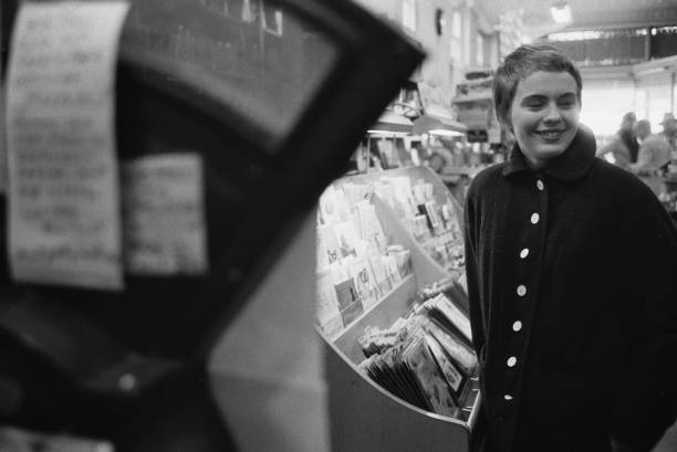 Jean Seberg in a shop in her home town of Marshalltown, Iowa- 1957 Photo