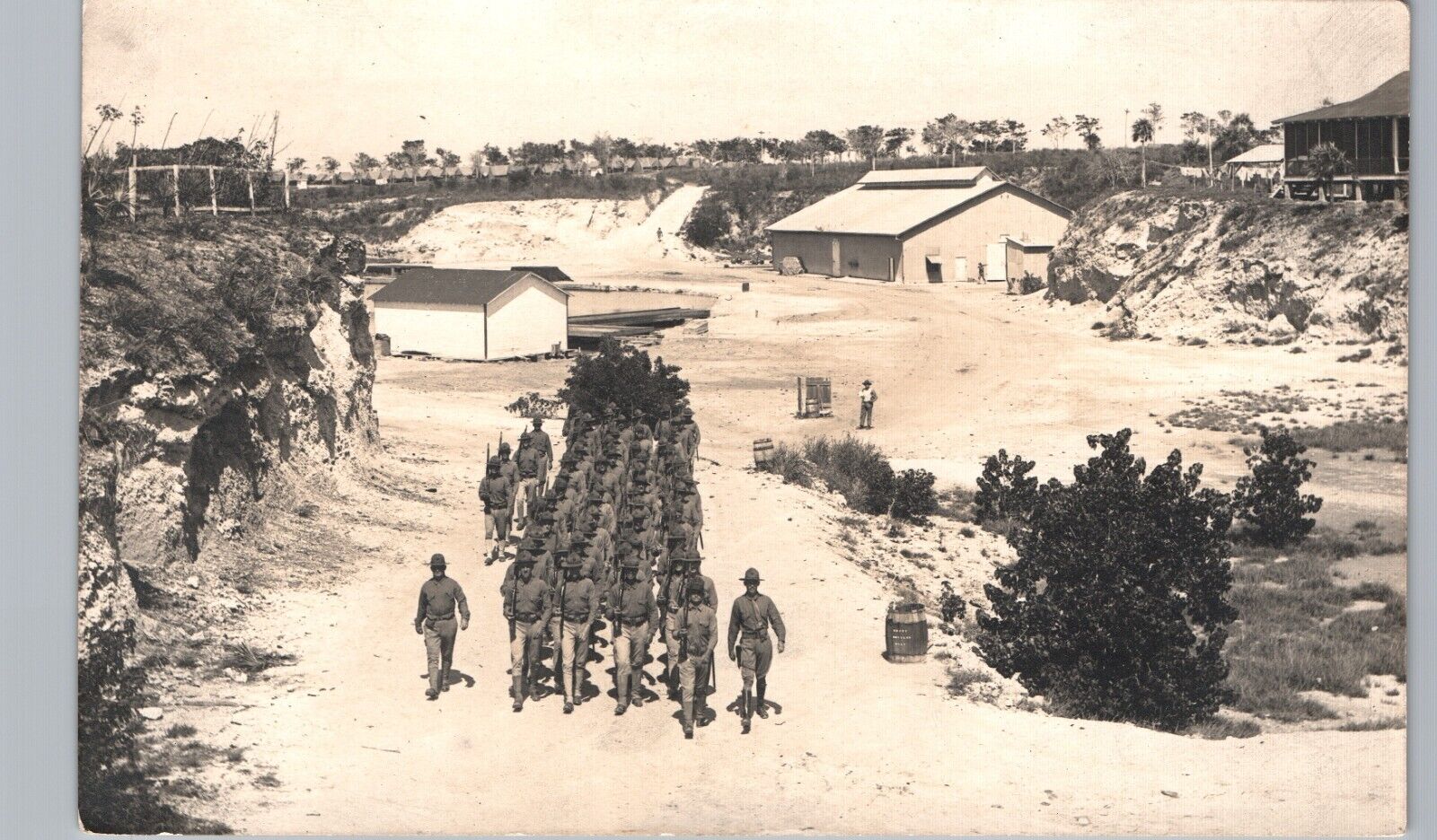 US SOLDIERS MARCHING mexico border war? real photo postcard rppc army base camp