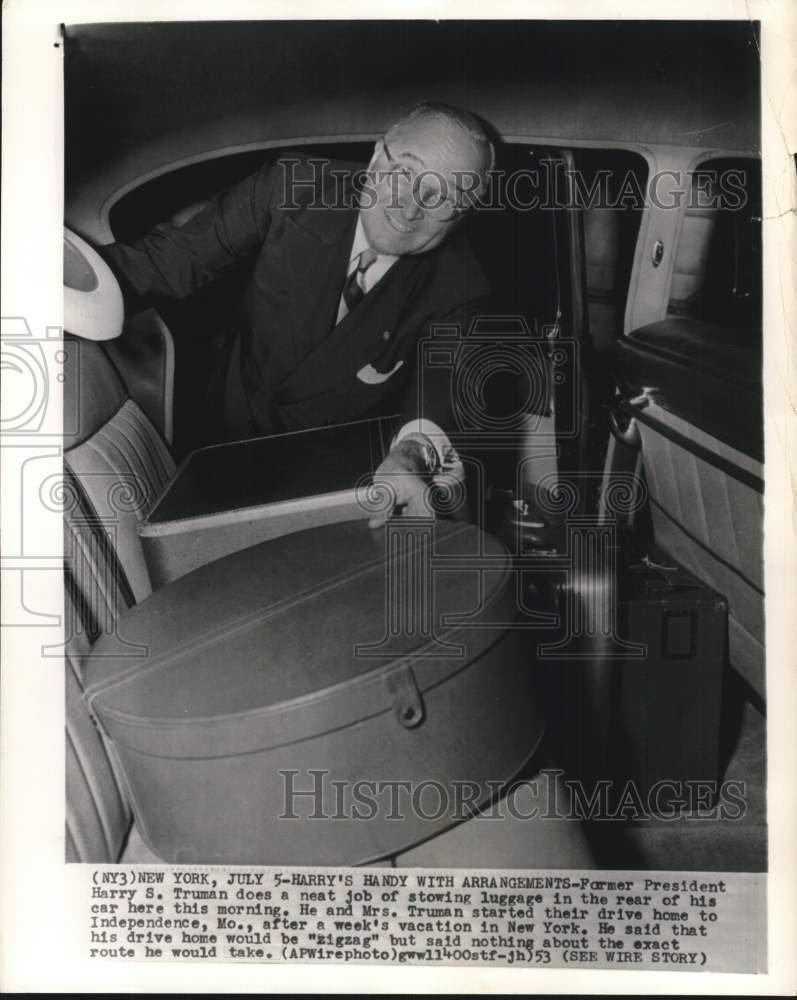 1953 Press Photo Former President Harry S. Truman stows luggage in car, New York