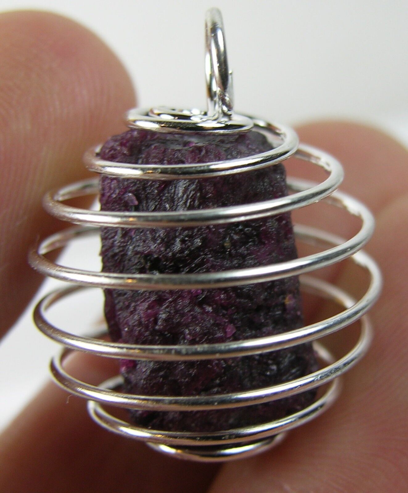 India Natural Dark Red Fluorescent Ruby Crystal Specimen in Spiral Cage Pendant