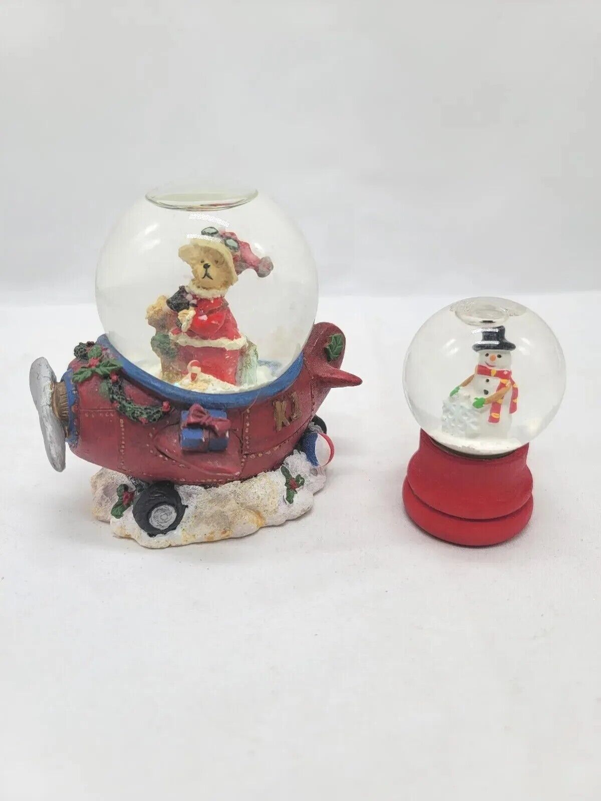 2 Christmas Snow Globes Bear In An Airplane and Snowman  