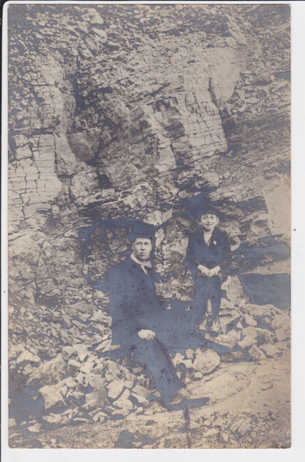 RPPC Man and boy hiking next to rock face antique Real Photo Postcard UN-POSTED