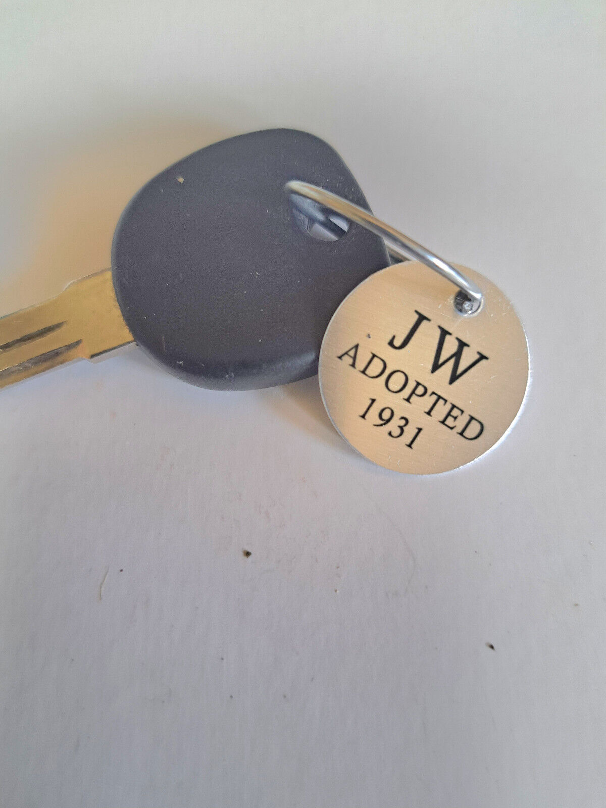   STAMPED JW ADOPTED 1931 THE YEAR JW WAS ADOPTED/ SILVER COLORED KEY FOB