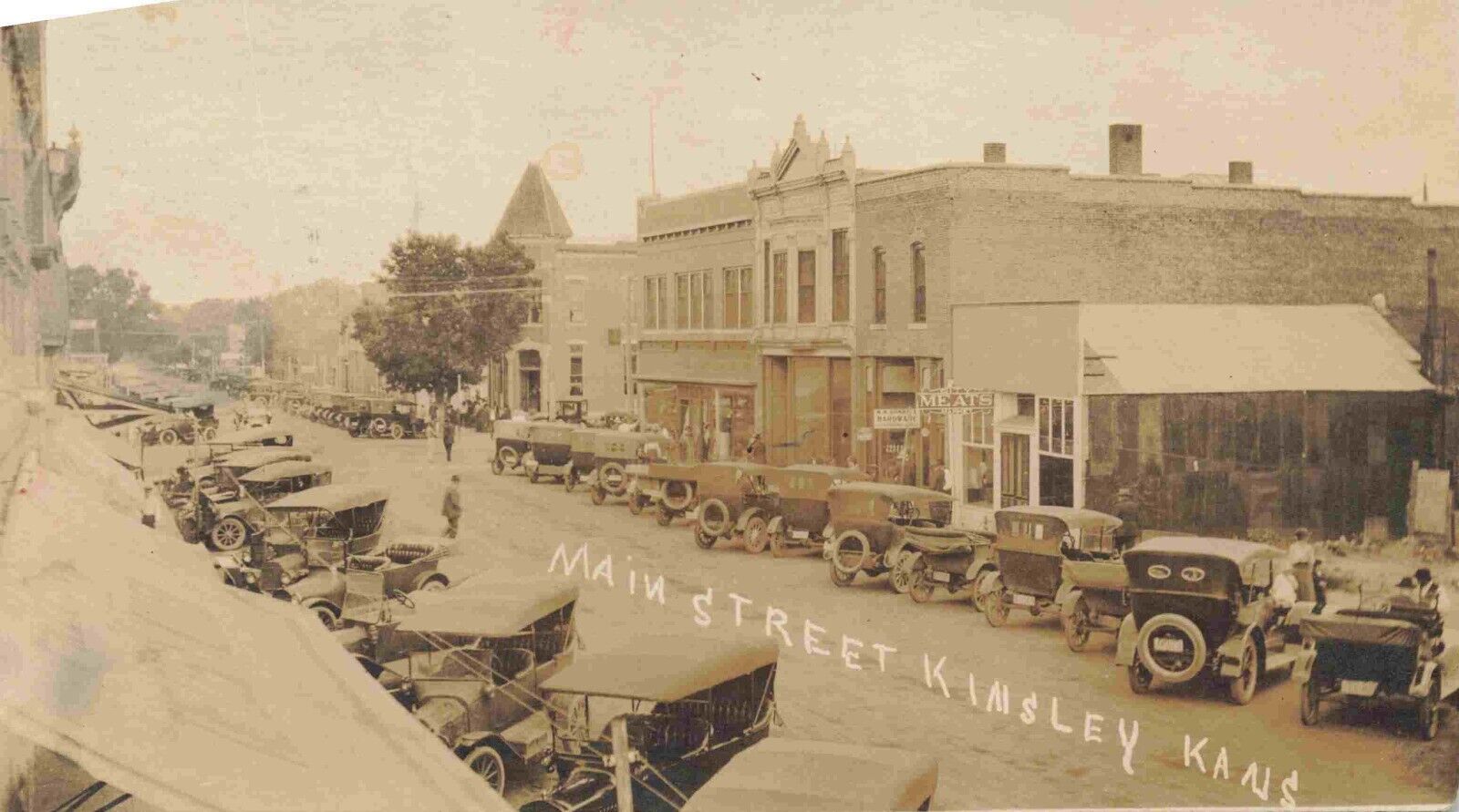 A View Of Autos Parked On Main Street, Kinsley, Kansas KS RPPC 1919 Trimmed Card