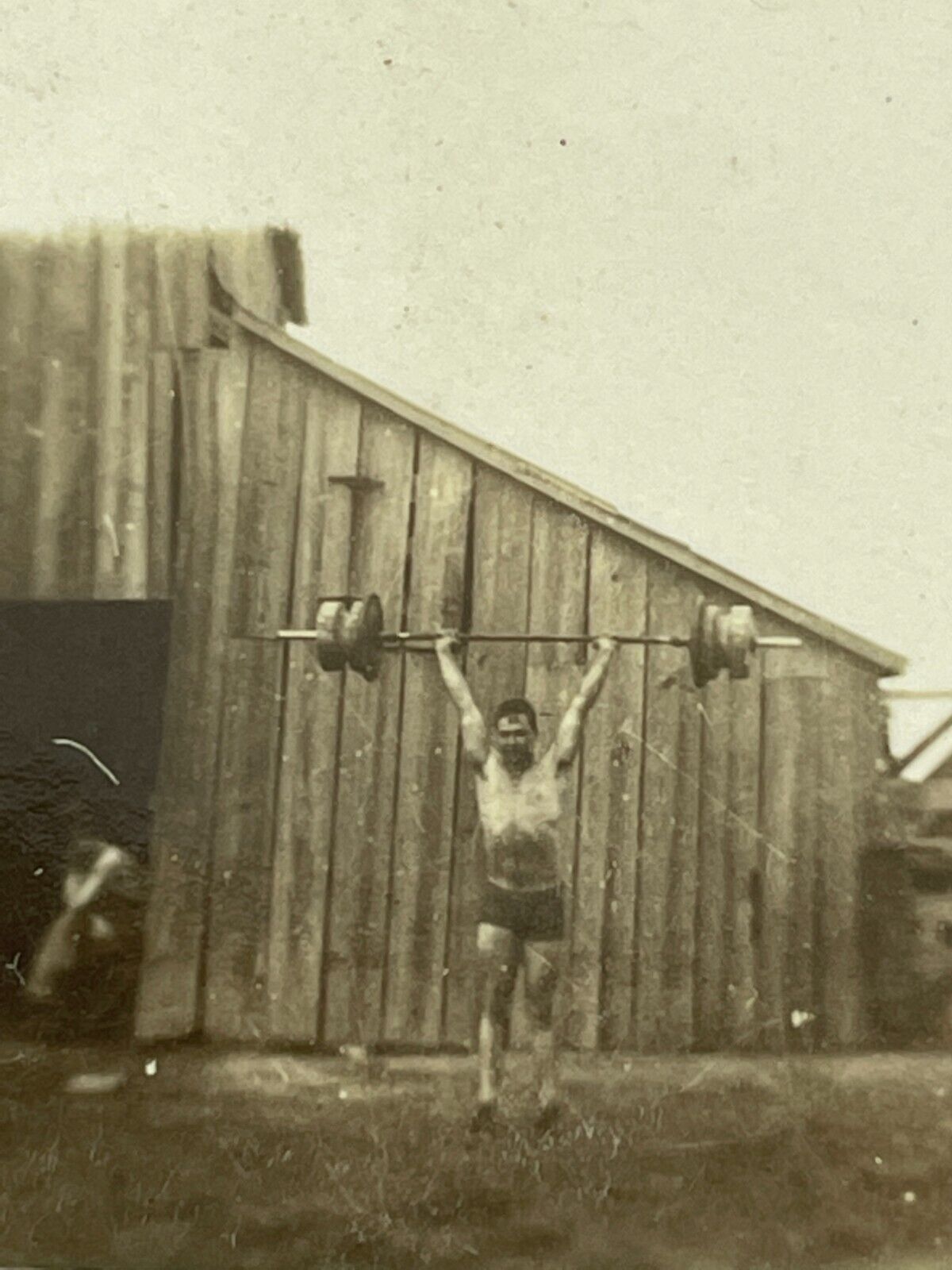R7 Small Photograph 1910-20\'s Farm Man Skinny Handsome Beefcake Barn Weight Lift