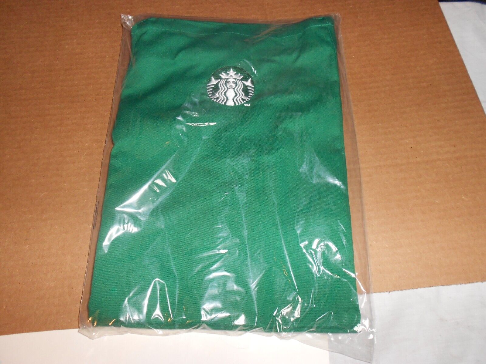Brand new Starbucks Barista apron , Logo, 2 pockets, and rear ties.
