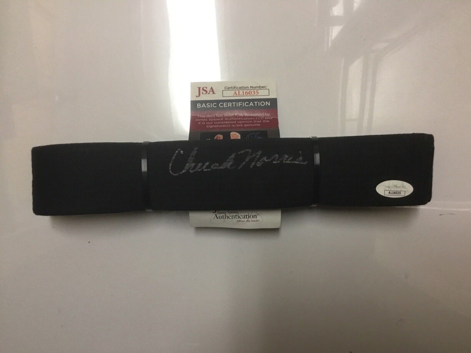 Chuck Norris autograph Black Belt (JSA)