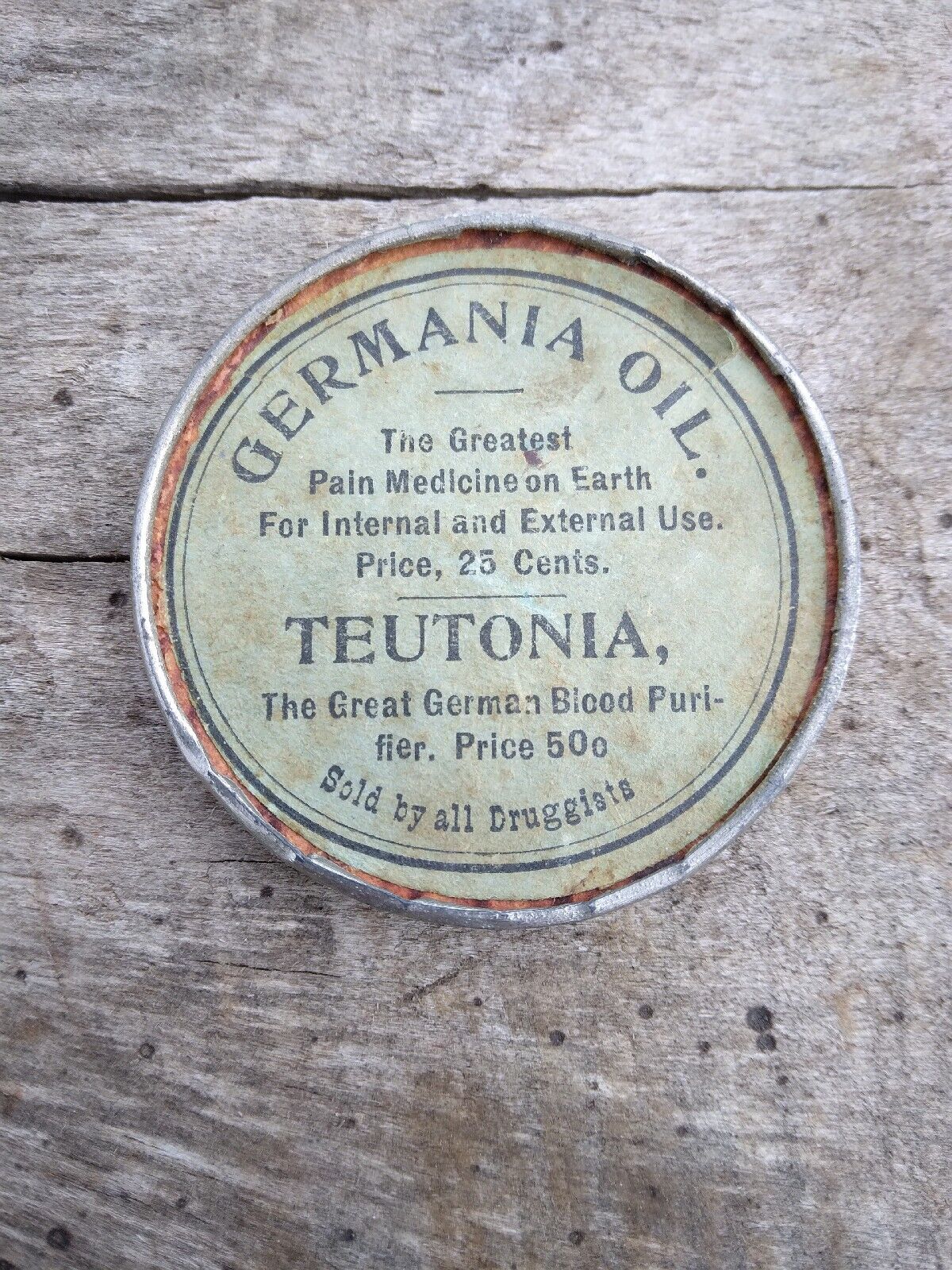 Antique Germania Oil Teutonia Advertising Pocket Mirror