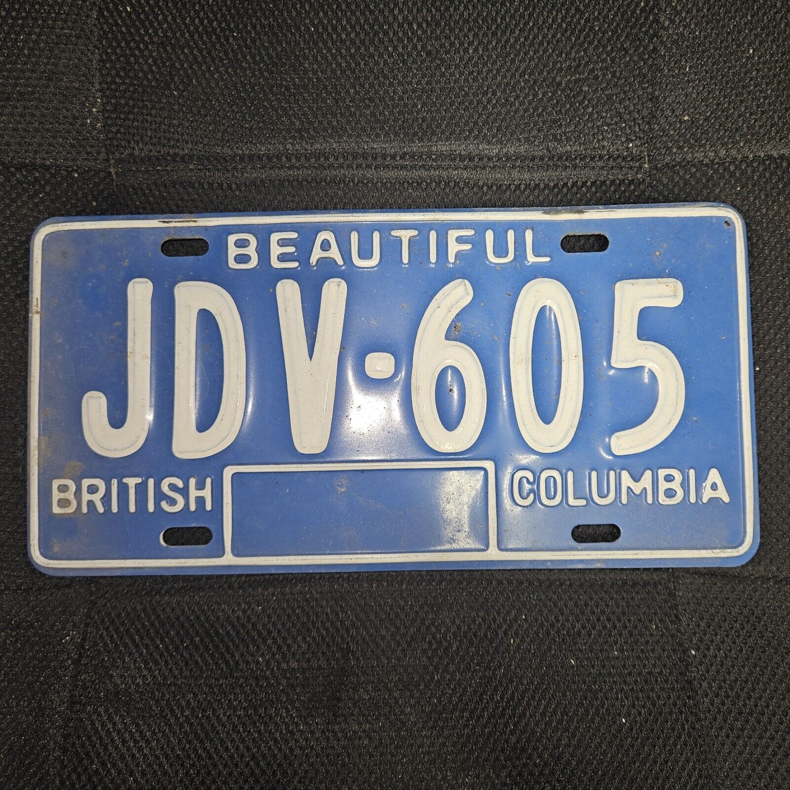1979 – 1985 British Columbia Vintage License Plate White And Blue No. JDV 605