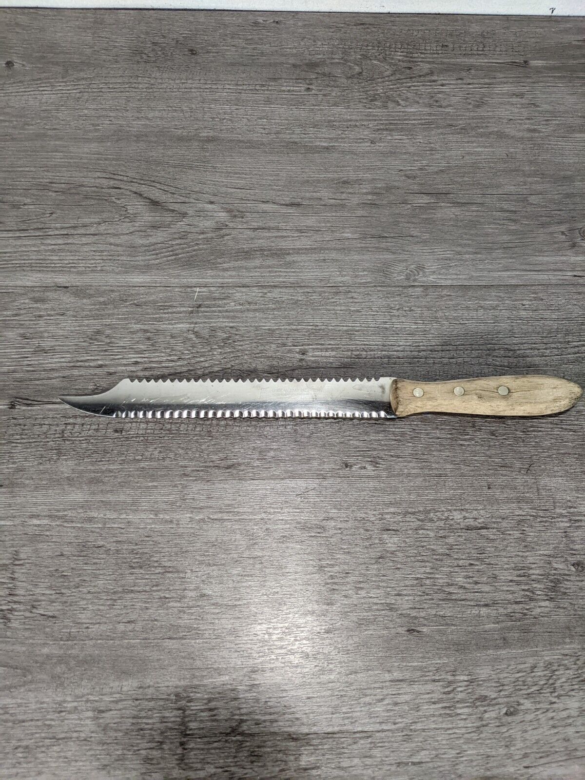 Vintage Gustav Emil Ern kitchen knife 9” serrated double blade.