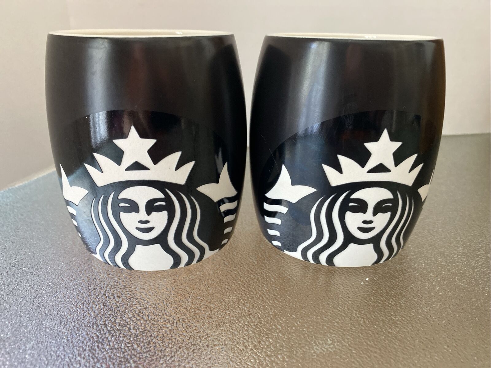 Pair of 2 Starbucks Laser Cut Ceramic Black & White Mugs 2011