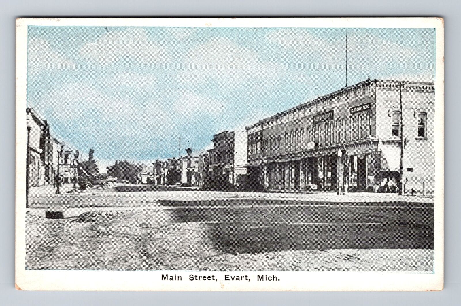 Evart MI-Michigan, Main Street Storefronts, Antique, Souvenir Vintage Postcard