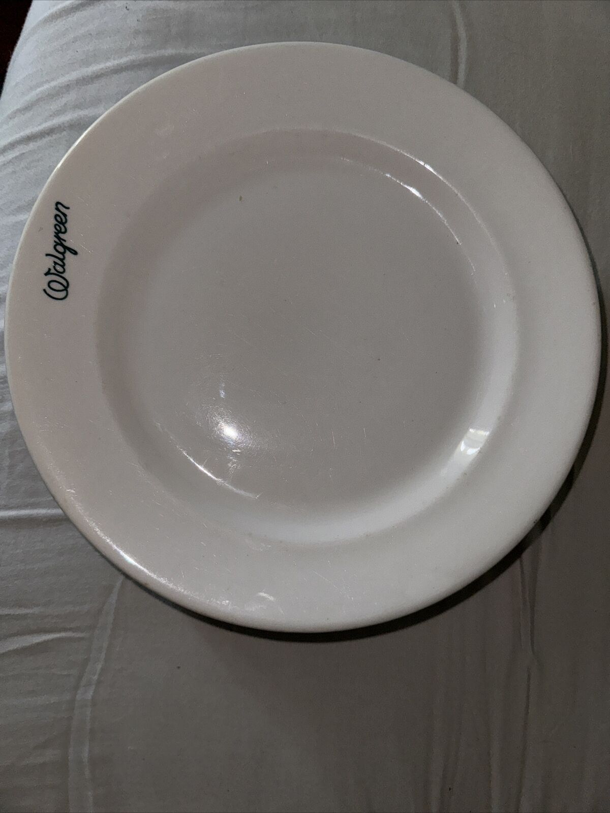 White Plate With Walgreen Written In Green