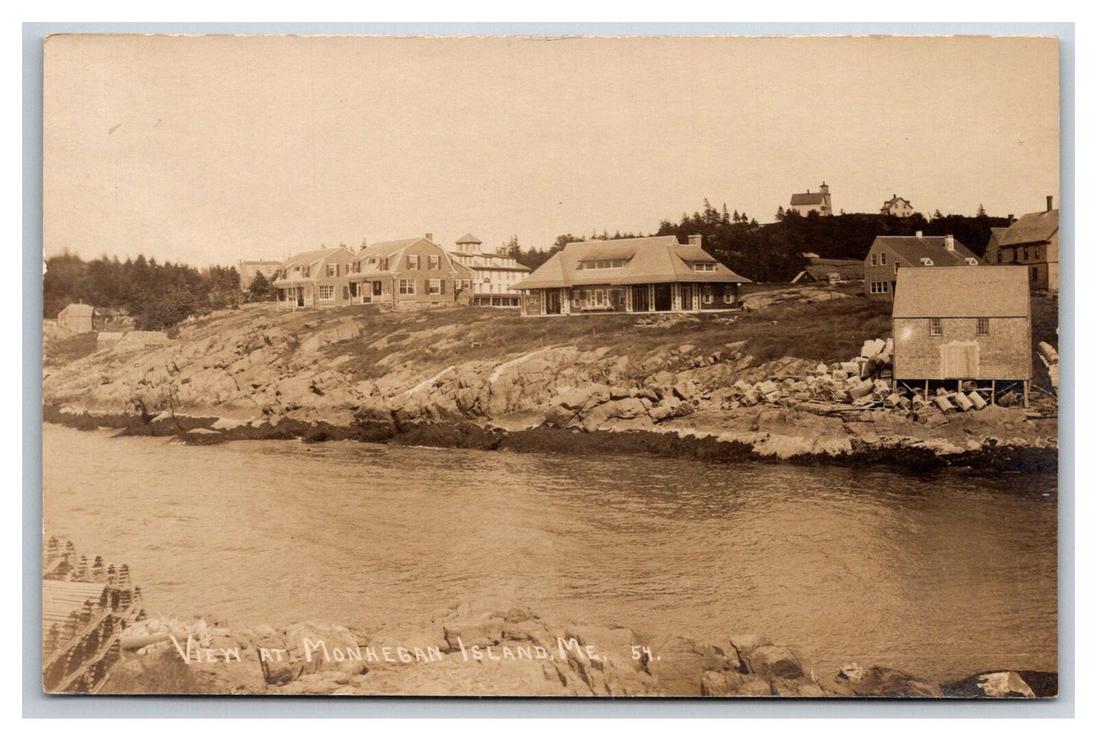 MAINE C. 1915 MONHEGAN ISLAND HARBOR TRIBLER COTTAGE, light house RPPC
