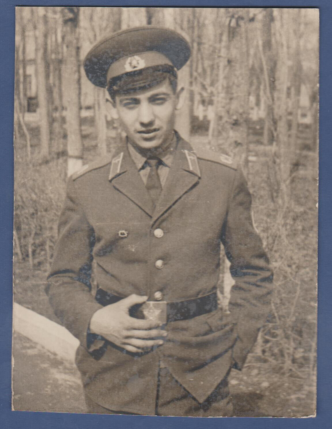 Handsome military guy in uniform. Soviet soldier. Soviet Vintage Photo USSR
