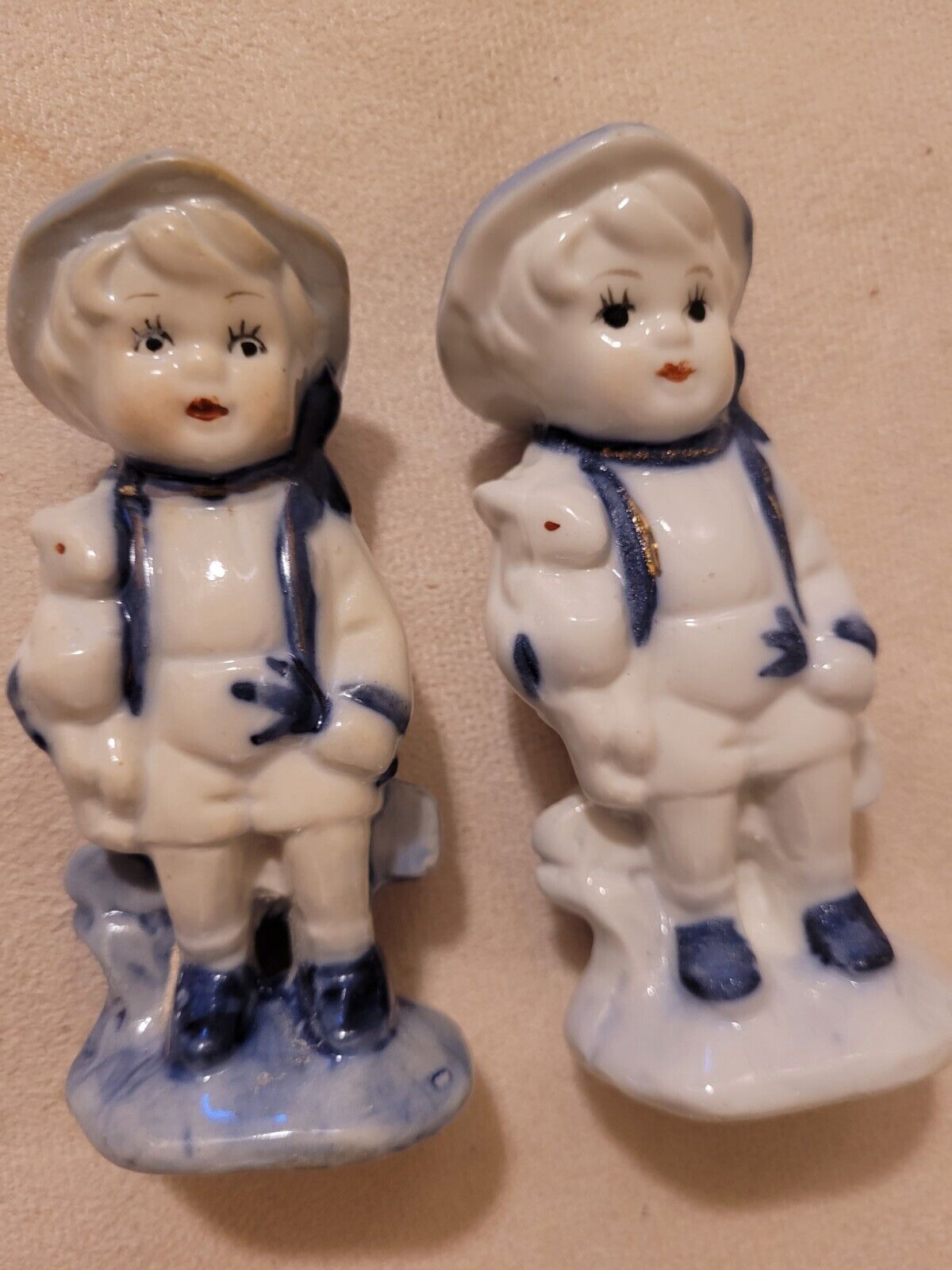 Pack with 2 Vintage Boy  Porcelain Ceramic  Figurines with bunny Rabbits.