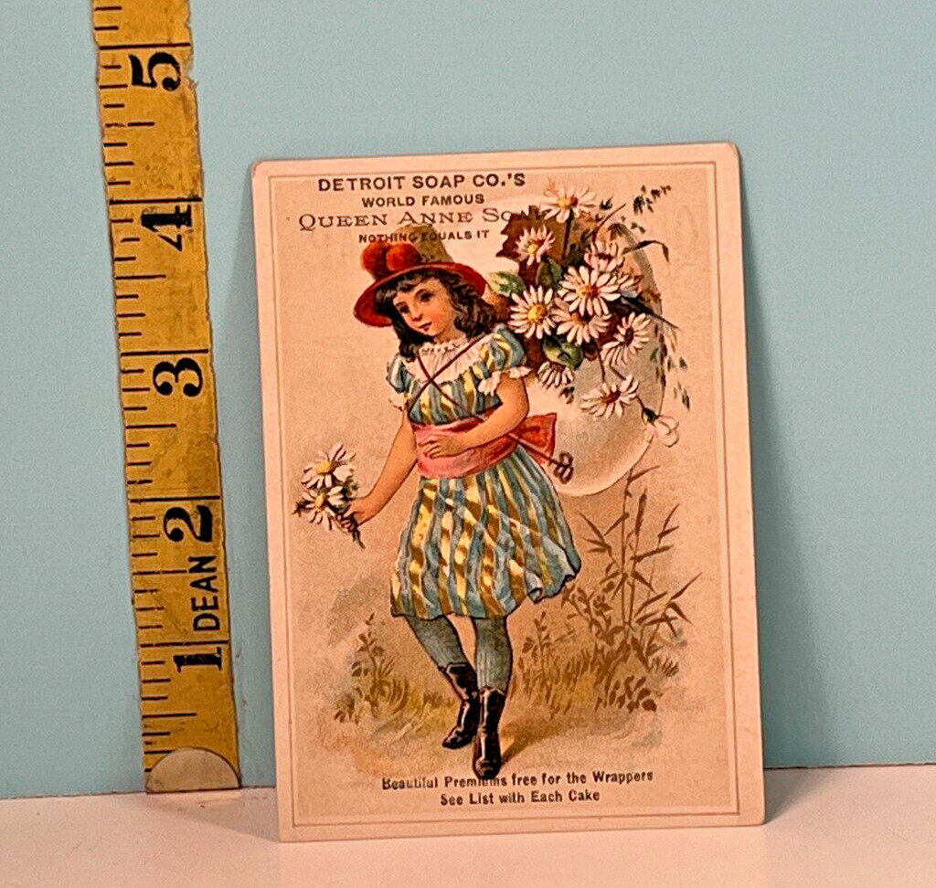 1800\'s Queen Anne Detroit Soap Co, Girl toting Bouquet of flowers trade card.