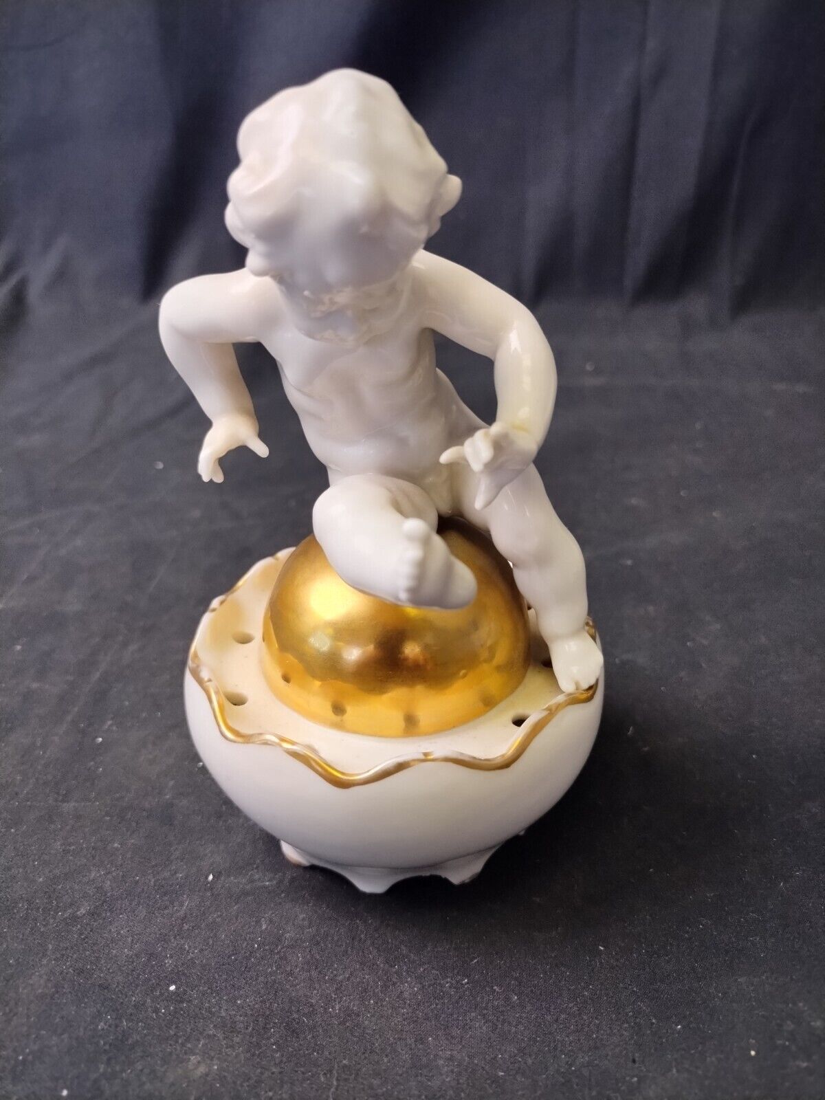Porcelain Cherub  Figurine On Gold Ball
