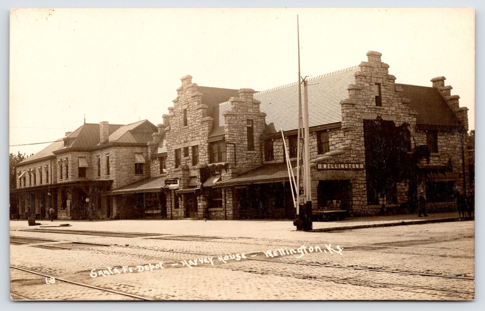 Postcard RPPC, Santa Fe Depot, Harvey House, R.R. Gate, Wellington, KS Unposted