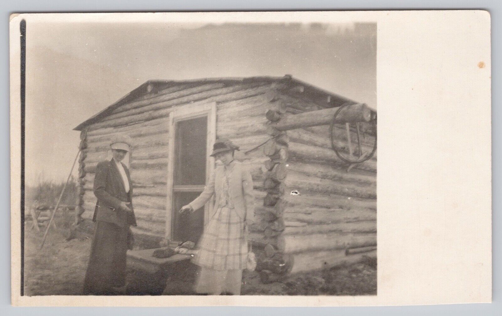 c1904 Very Old RPPC -CYKO Stamp Box - Two Women Posing in Front of Log Cabin -B2