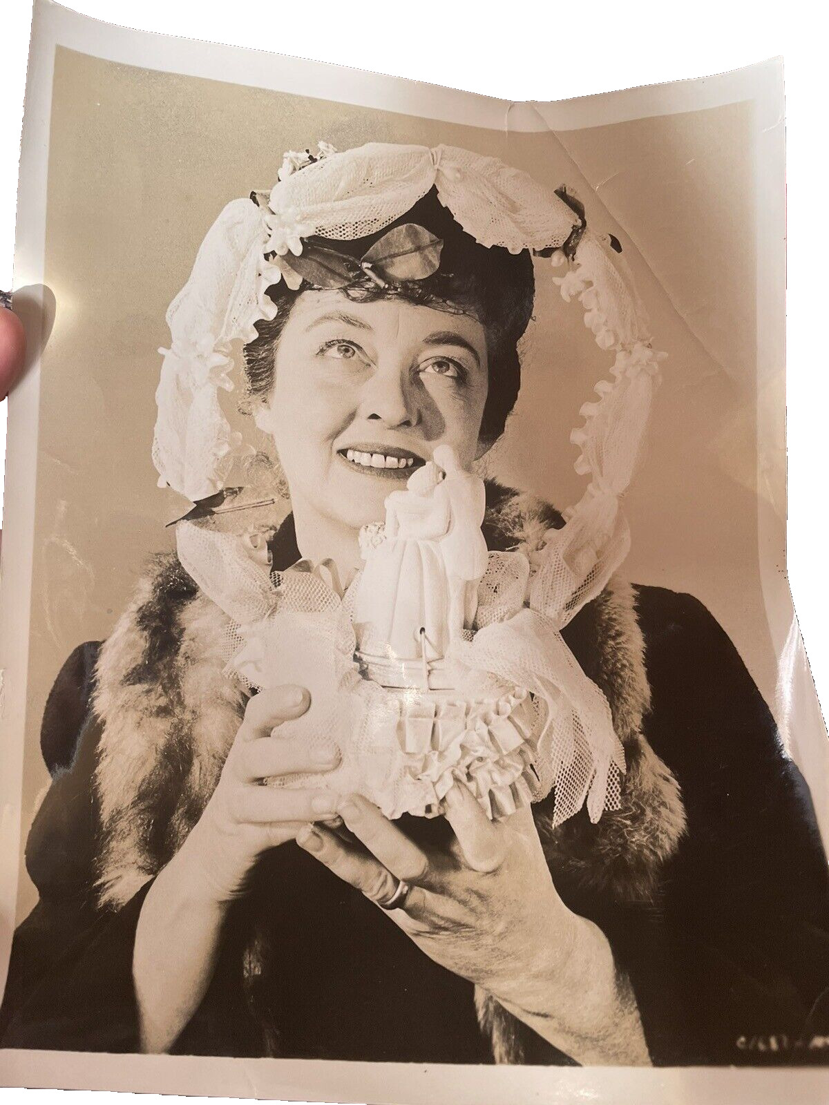Vintage Movie Press Photo Adult Woman in Hat holding wedding figurine 1960's