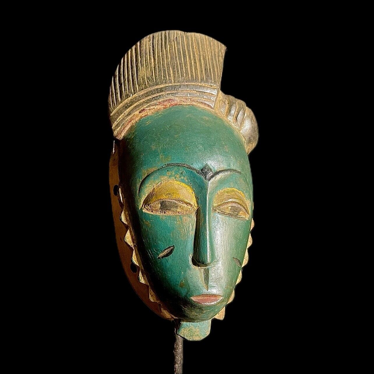African guru mask with a special hairstyle in brown colors, an ancient mask-9228