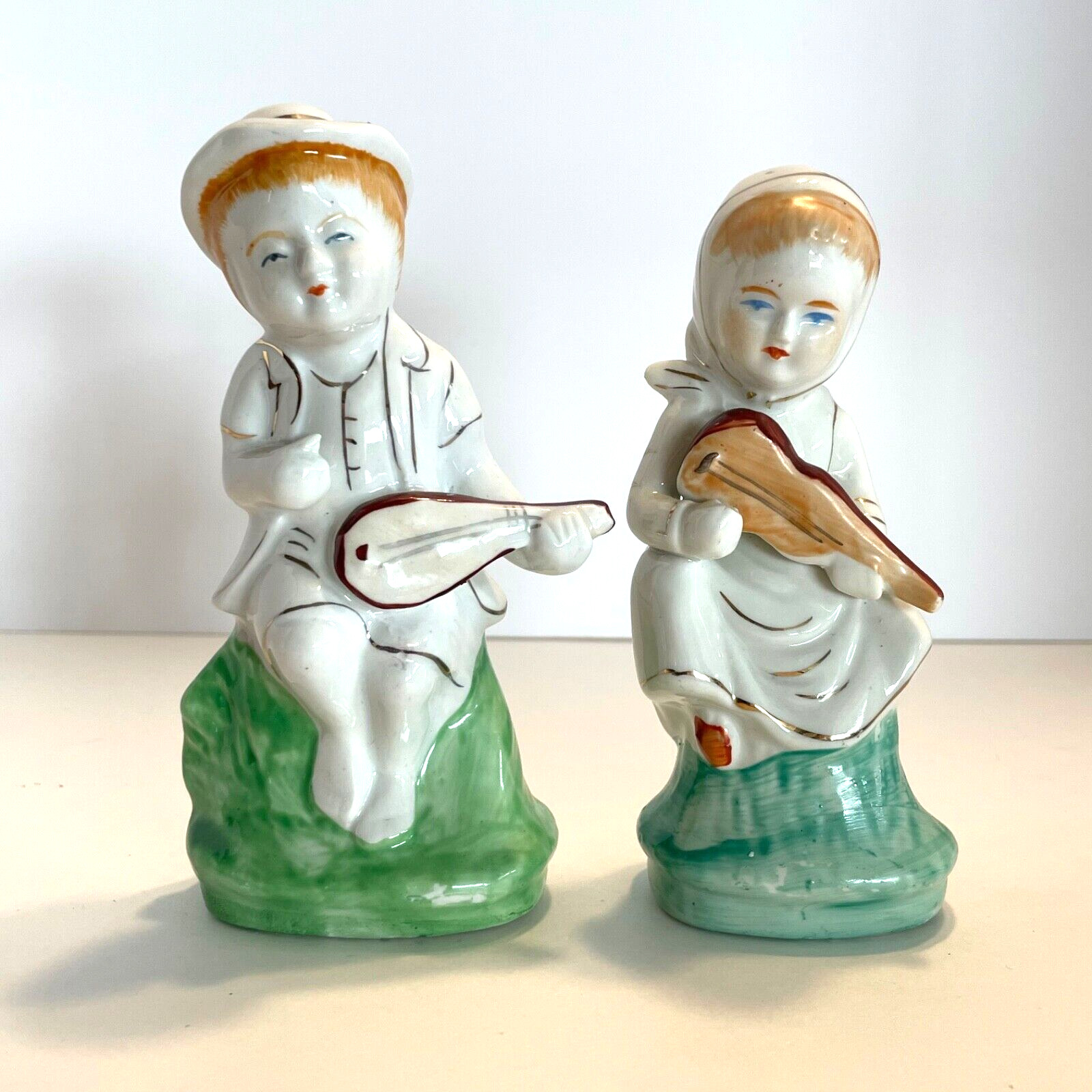 Set of 2 Vintage Porcelain Figurines Boy and Girl Playing Instruments