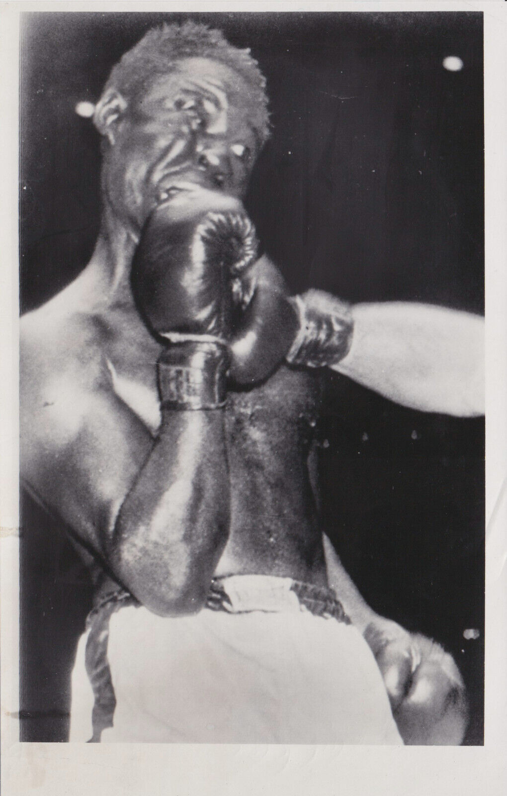 1954 Press Photo Heavyweight Boxer Ezzard Charles is Punched by Rocky Marciano