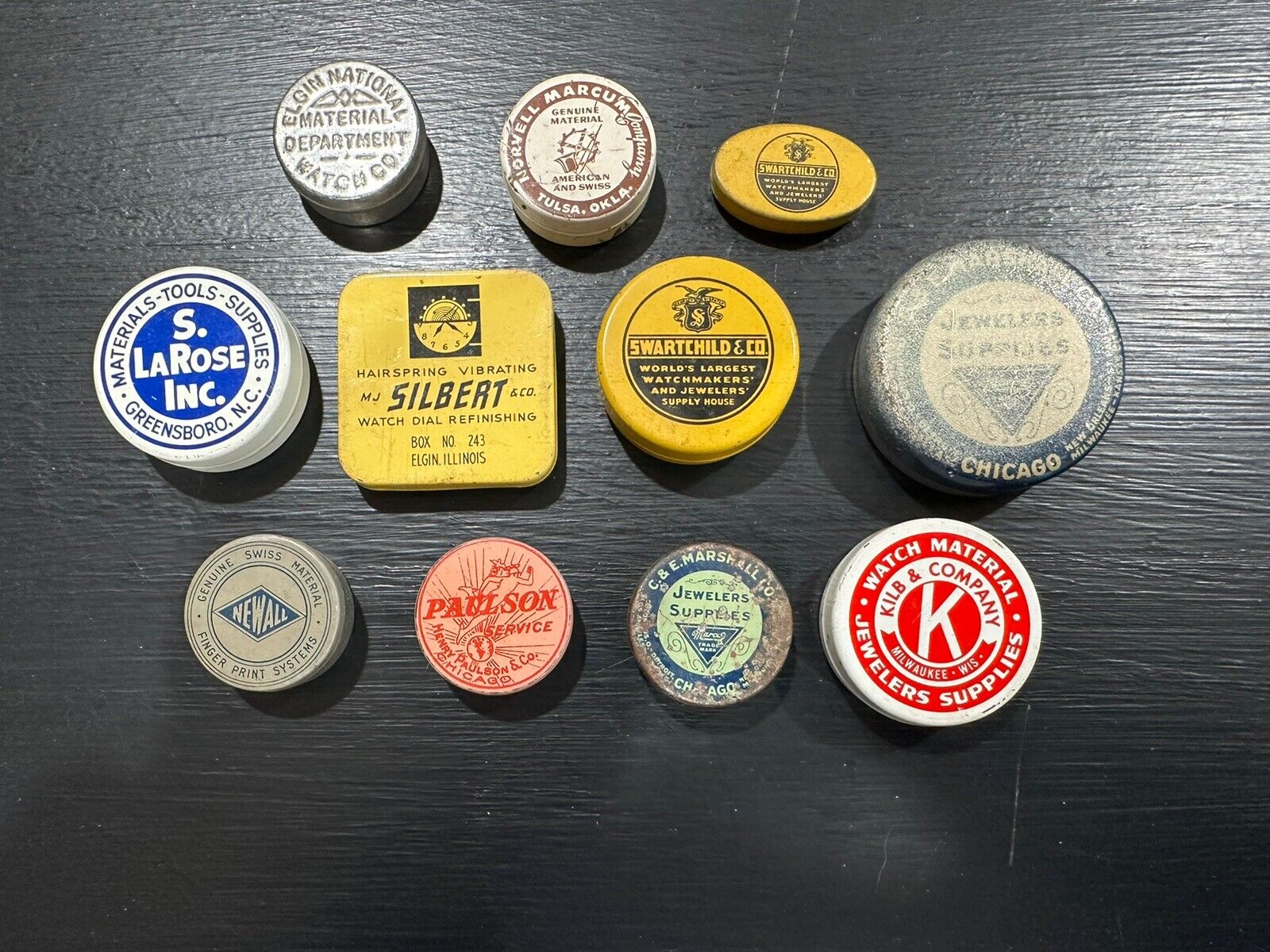 Eleven Vintage Jewelers or Watchmaking Advertising Tins Wonderful Collection