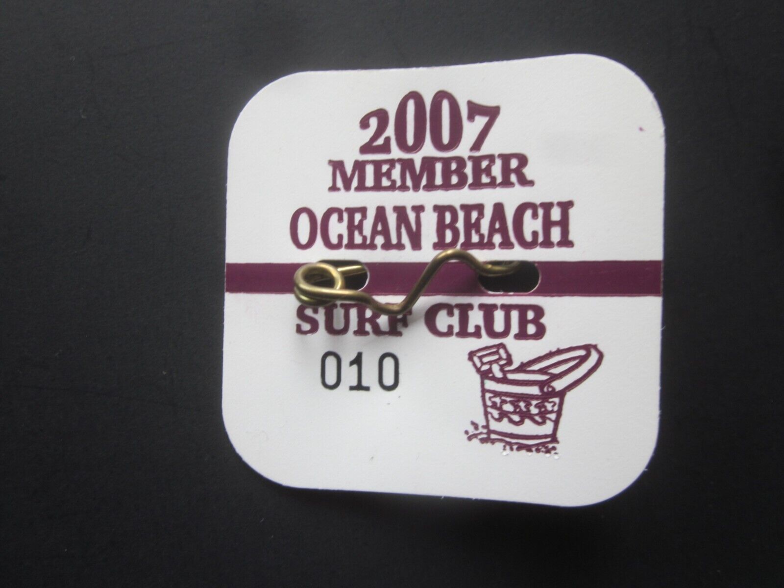 2007 OCEAN  BEACH  NEW  JERSEY SURF CLUB SEASONAL  BEACH  BADGE/TAG 17 YEARS OLD