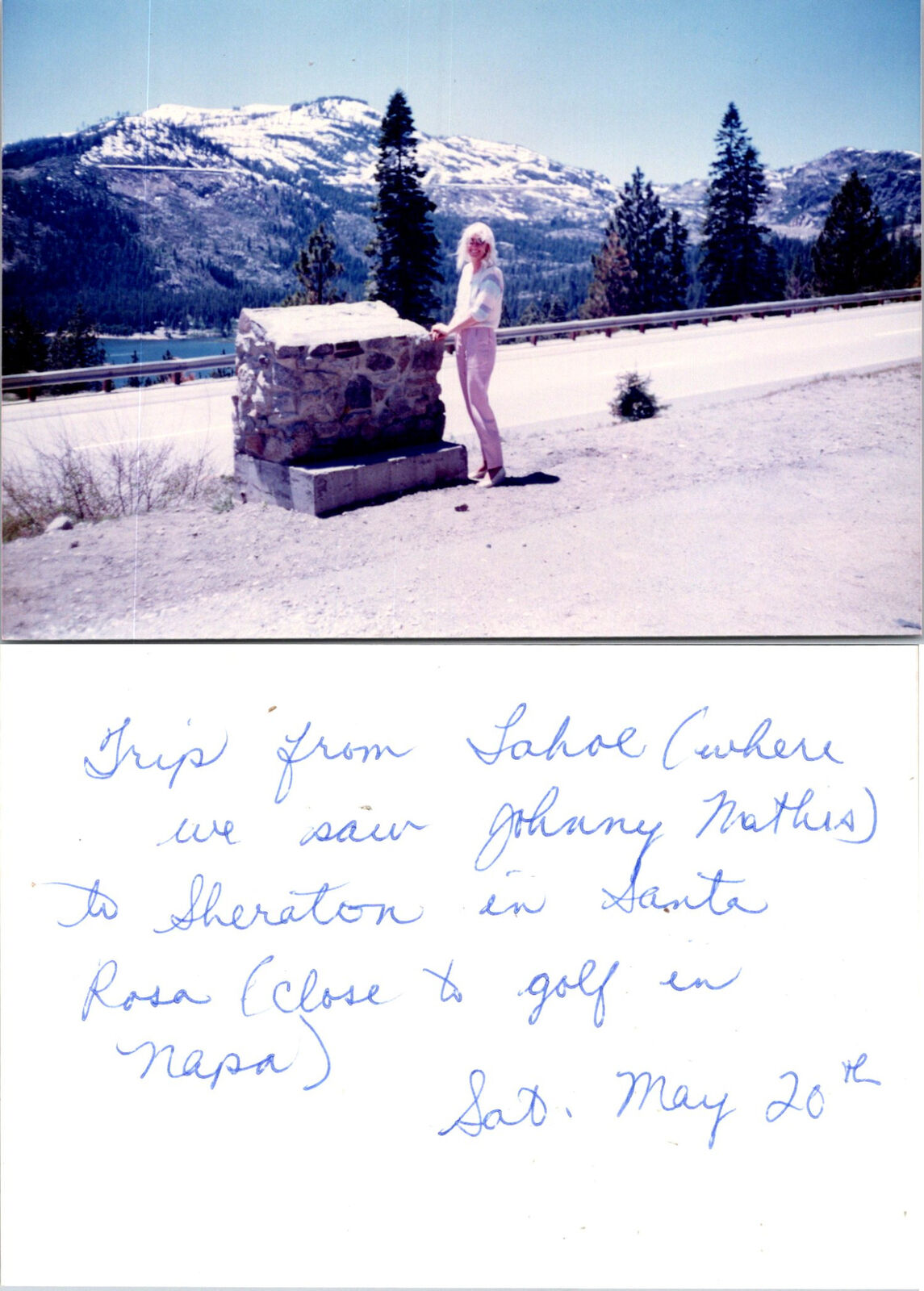 Woman standing with mountains of Lake Tahoe in background Found Photo V1204