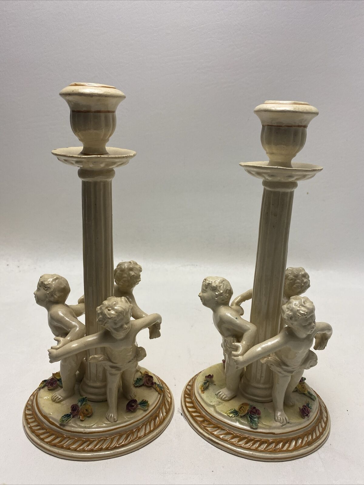 Antique Pair Ornate Porcelain Candle Holders Figurine Cherubs Encircled W/Roses