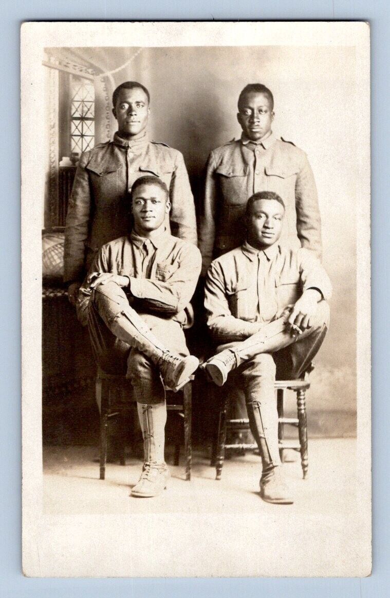 RPPC 1915. WWI AFRICAN AMERICAN SOLDIERS, ONE SMOKING CIGAR. POSTCARD L28