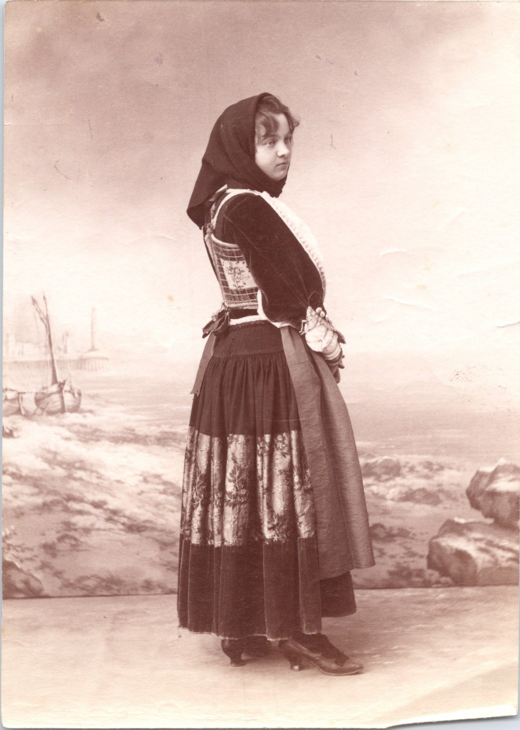 Young woman in costume from Sardinia, vintage print, ca.1890 young woman in cost