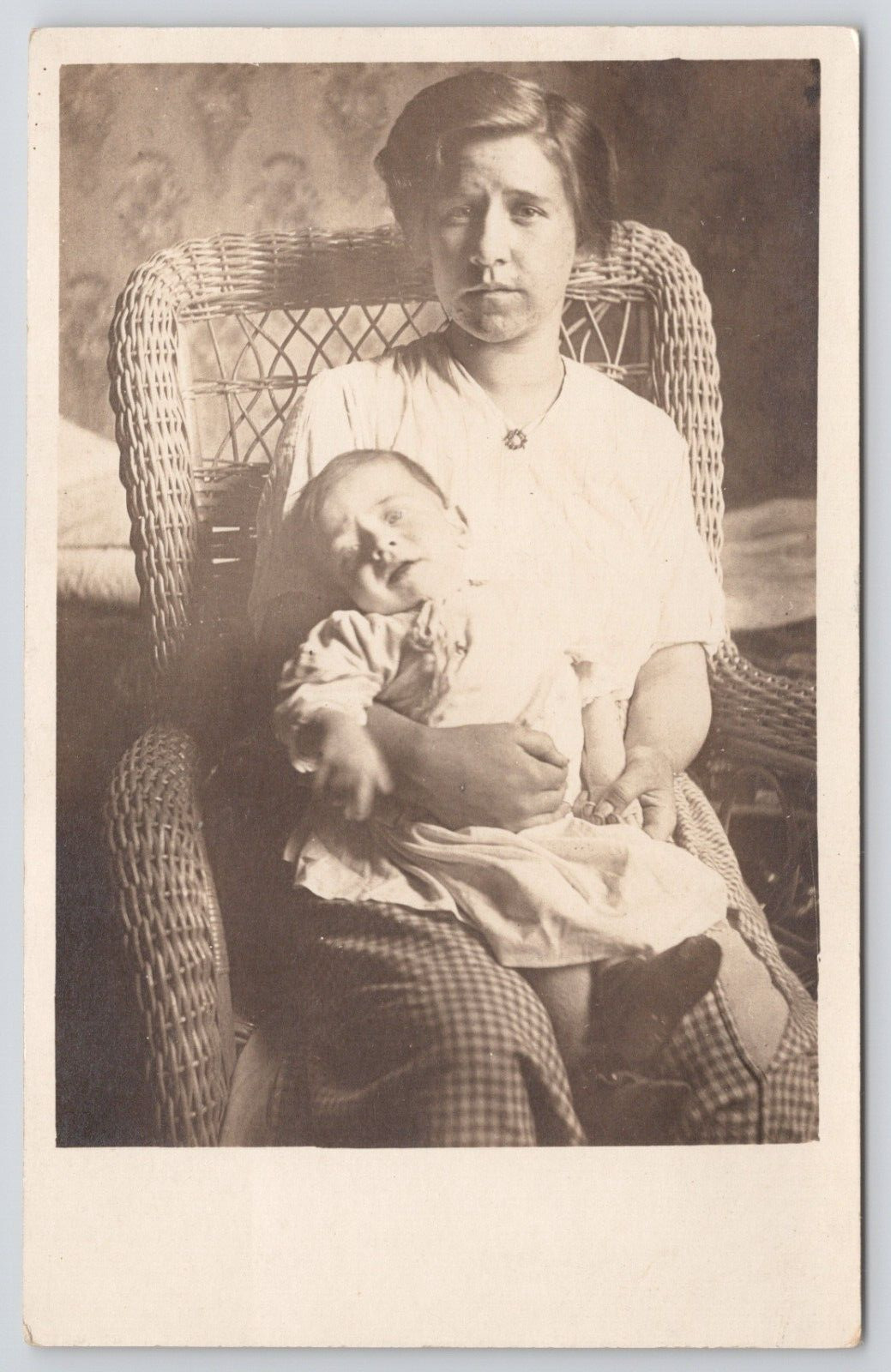 RPPC Women in Studio Wicker Chair Holding Baby c1905 Real Photo Postcard