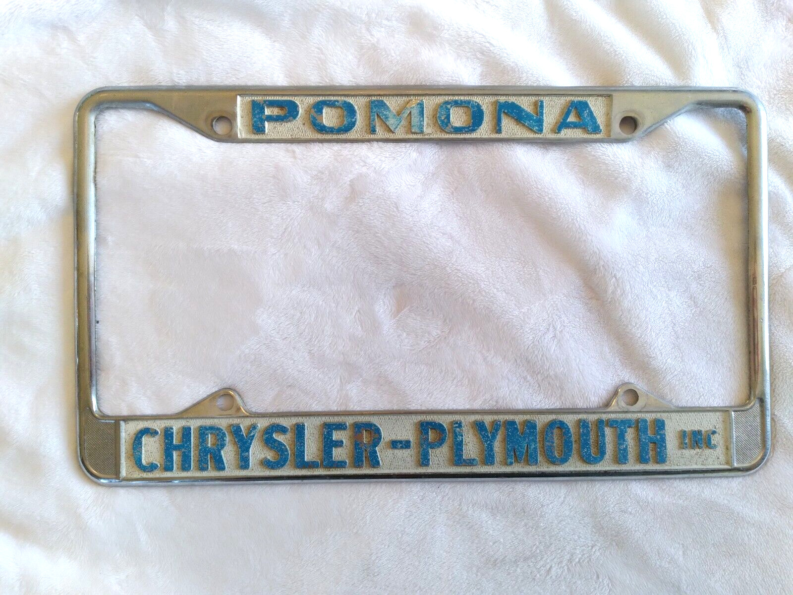 Vtg Pomona Chrysler Plymouth Dealership License Plate Frame Robert W Brown MOPAR