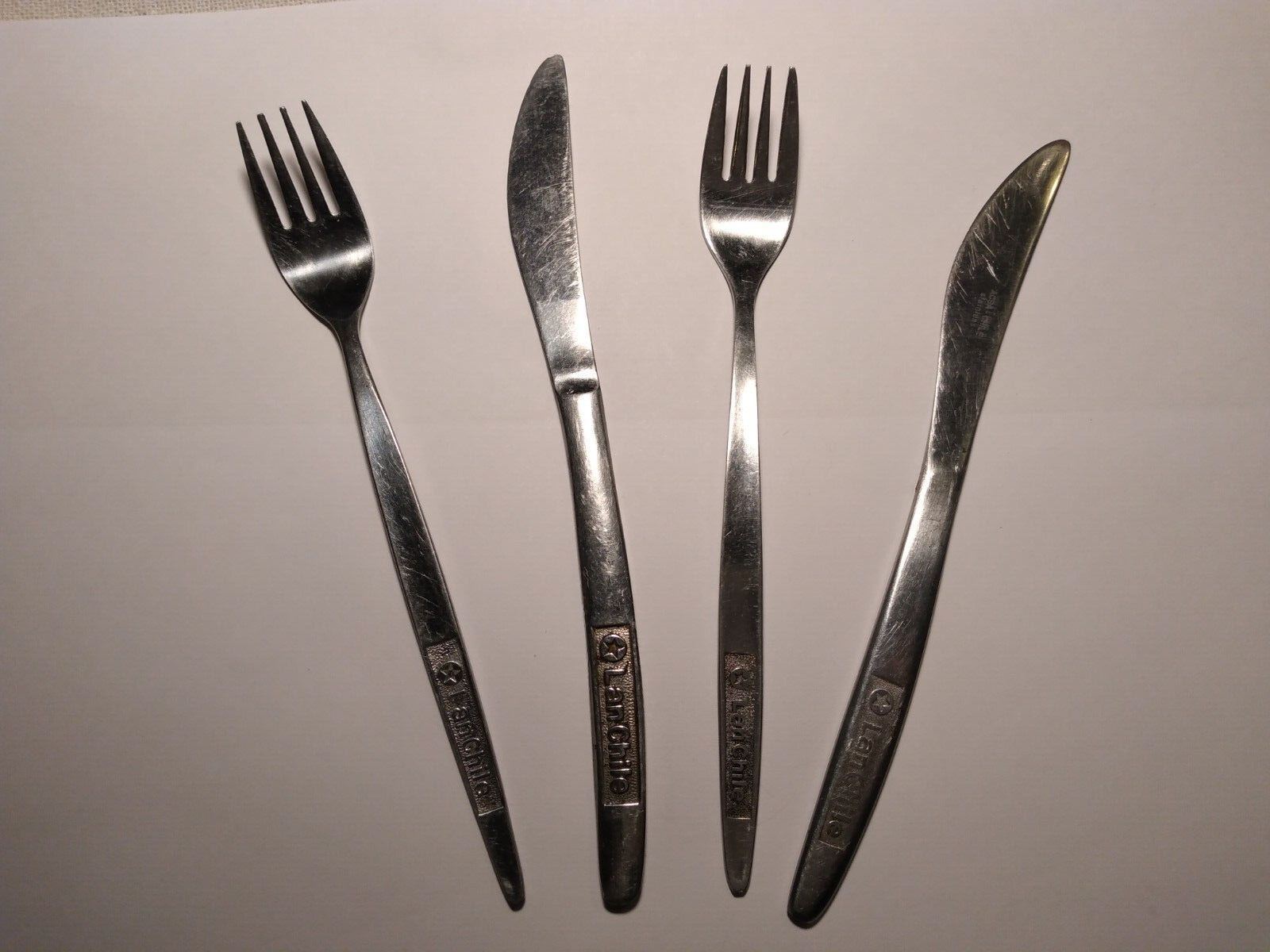 LOT OF 4 OLD LAN CHILE AIRLINES FORKS AND KNIVES SILVERWARE
