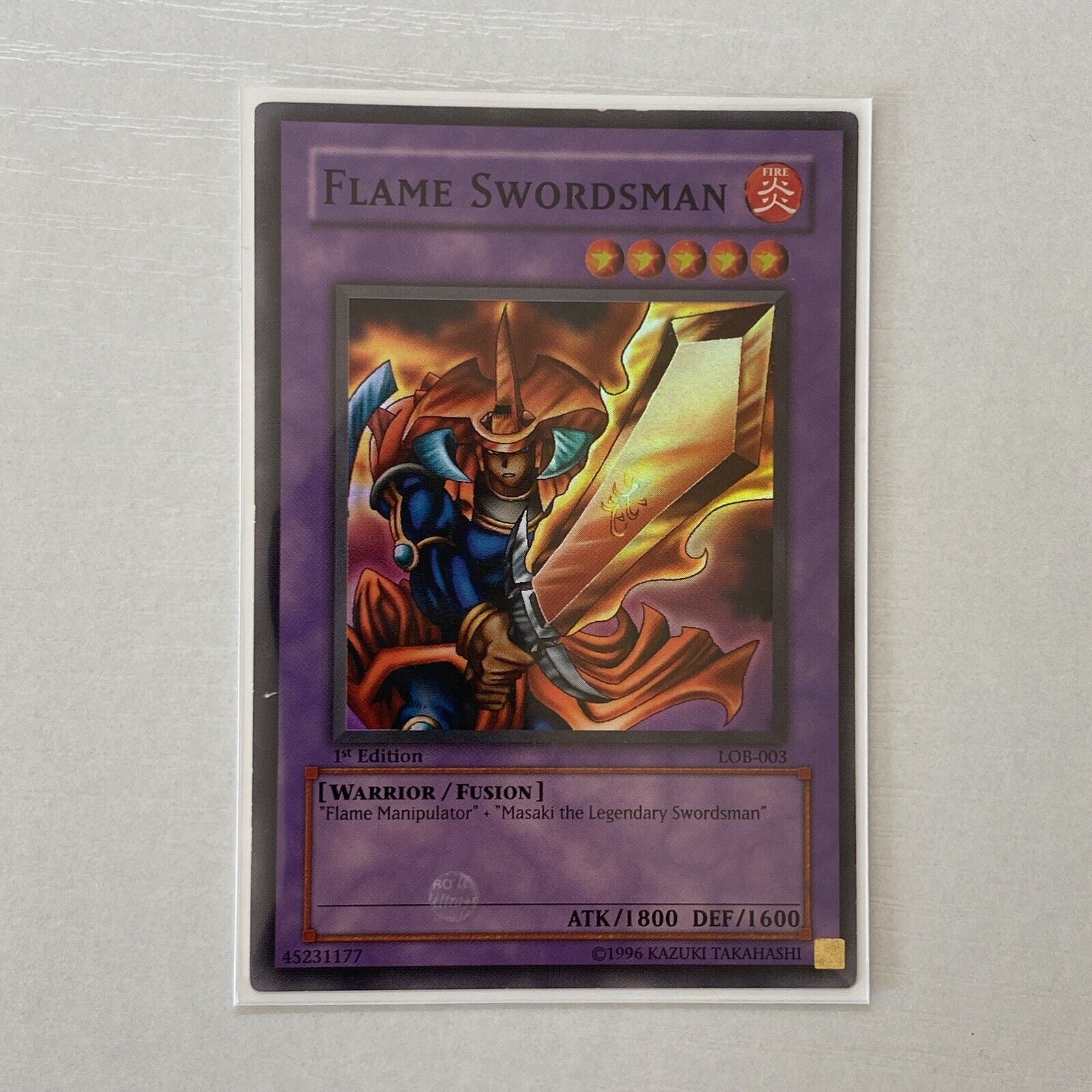 YuGIOh - 1st Edition LOB-003 Flame Swordsman - North American LP