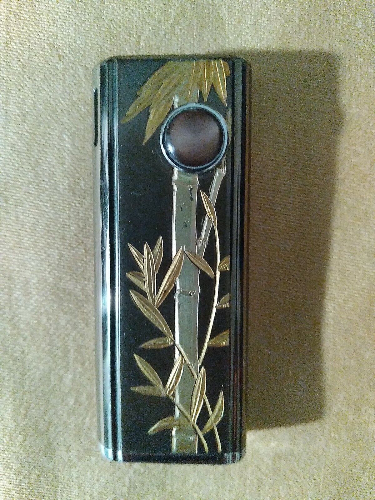 WIN cigarette lighter With Etched Bamboo Leaves