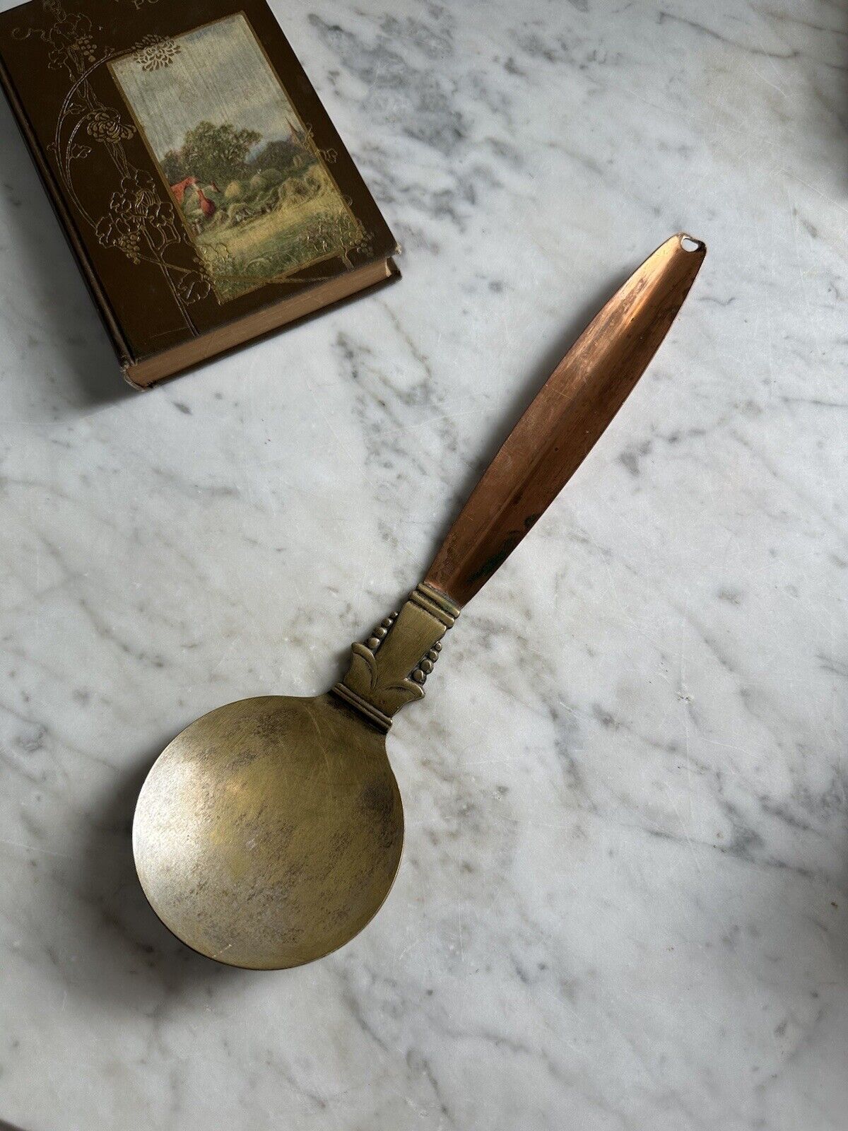 vintage brass and copper spoon